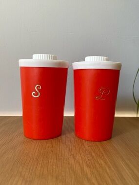 Vintage MCM Plastic Salt And Pepper Shakers Orange With White Lid